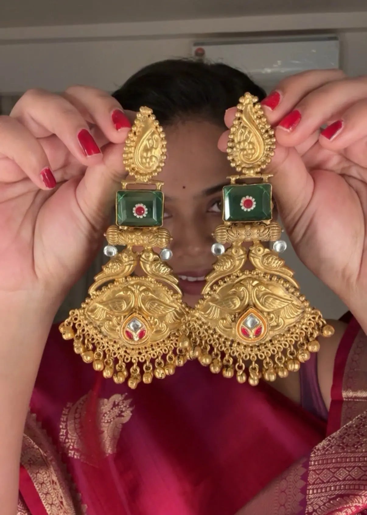 Sakshi Gold tone chandbali earrings in Black and Green colour KH